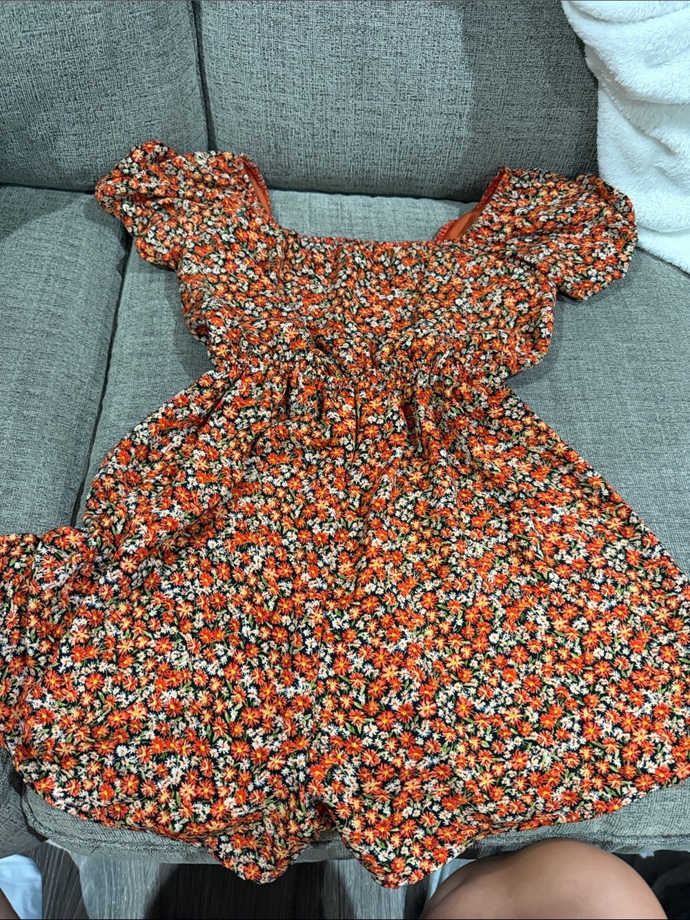 Francesca's Collections Orange Floral Smocked Romper